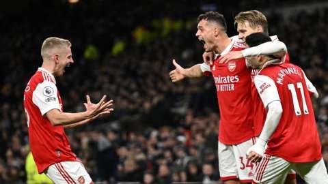 Arsenal win derby, go eight points clear at top